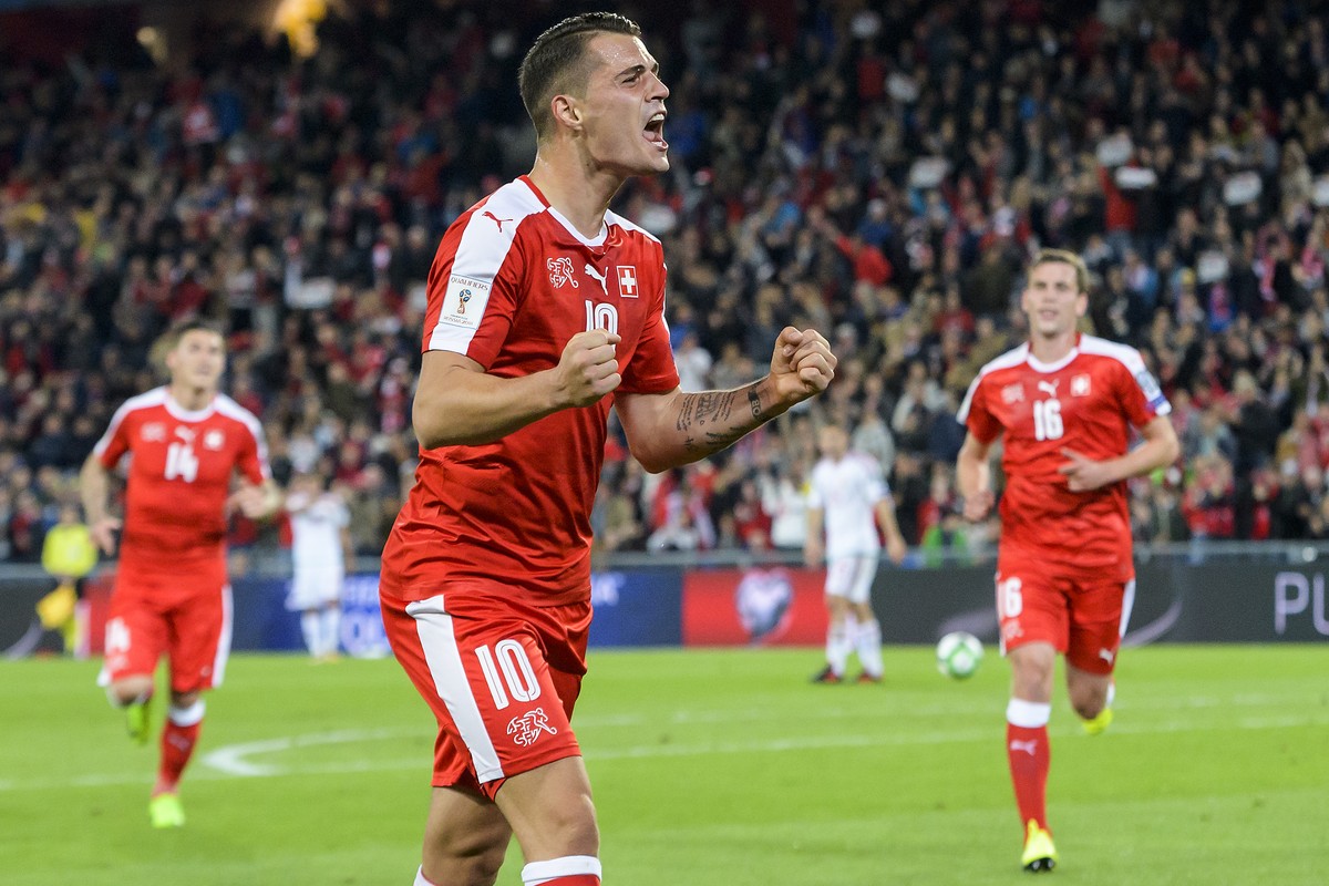 Switzerland's Granit Xhaka, celebrates after scoring the 1:0, during the 2018 Fifa World Cup Russia group B qualification soccer match between Switzerland and Hungary in the St. Jakob-Park stadiu ...