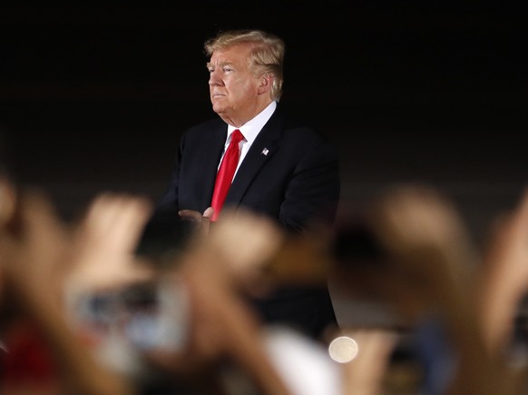 President Donald Trump arrives to a campaign rally Friday, Oct. 19, 2018, in Mesa, Ariz. Trump is in Arizona stumping for Senate candidate U.S. Rep. Martha McSally, R-Ariz. (AP Photo/Matt York)