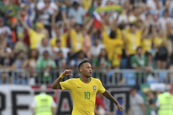 Brazil&#039;s Neymar celebrates at the end of the round of 16 match between Brazil and Mexico at the 2018 soccer World Cup in the Samara Arena, in Samara, Russia, Monday, July 2, 2018. Neymar scored o ...