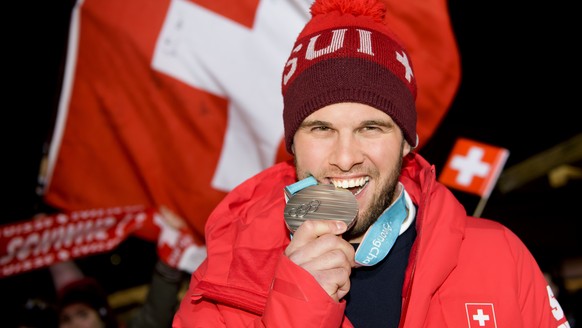 Silver medalist Marc Bischofberger of Switzerland celebrates at the House of Switzerland after the Men Freestyle Skiing Ski Cross final during the XXIII Winter Olympics 2018 in Pyeongchang, South Kore ...