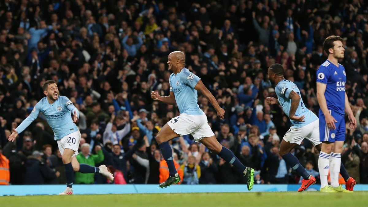 epa07551935 Manchester City's Vincent Kompany (C) celebrates scoring a goal during the English Premier League soccer match between Manchester City and Leicester City at the Etihad Stadium in Manc ...