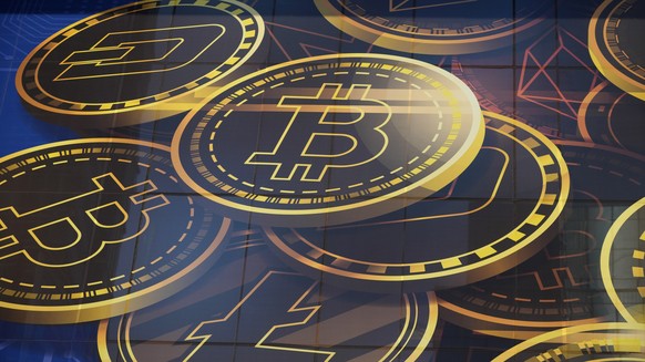 FILE - An advertisement for the cryptocurrency Bitcoin is displayed on a building in Hong Kong on Nov. 18, 2021. (AP Photo/Kin Cheung, File)
Kidnapping-Crypto Theft