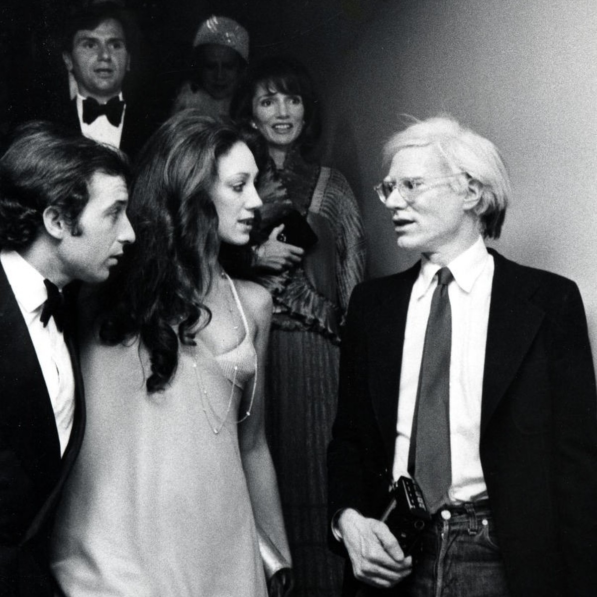 Ricky von Opel, Marisa Berenson and Andy Warhol during "American Women of Art" Exhibition at Metropolitan Museum of Art in New York City, New York, United States. (Photo by Ron Galella/Ron G ...