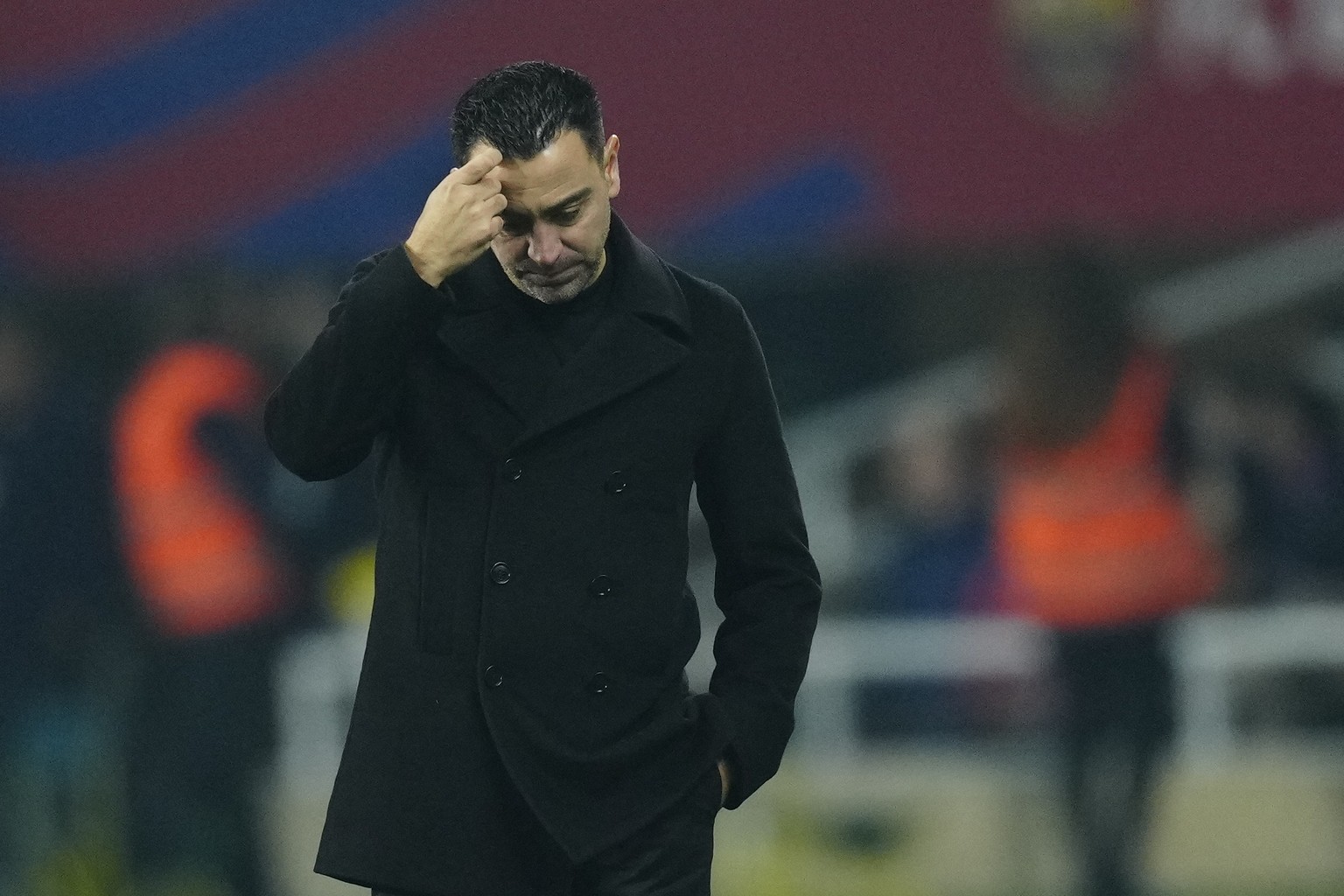 epa11109056 FC Barcelona&#039;s head coach Xavi Hernandez scratches his head during the Spanish LaLiga soccer match between FC Barcelona and Villarreal CF, in Barcelona, Spain, 27 January 2024. EPA/En ...