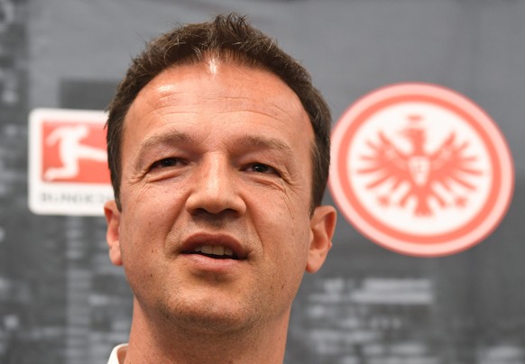 epa05339846 The new sports chairman of Eintracht Frankfurt Fussball AG Fredi Bobic speaks during a press conference in Frankfurt am Main, Germany, 01 June 2016. Bobic is taking over for departing chai ...