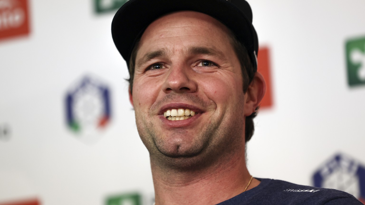 Switzerland&#039;s Beat Feuz smiles as he meets the media during a press conference in Bormio, Italy, Monday, Dec. 26, 2022. (AP Photo/Alessandro Trovati)