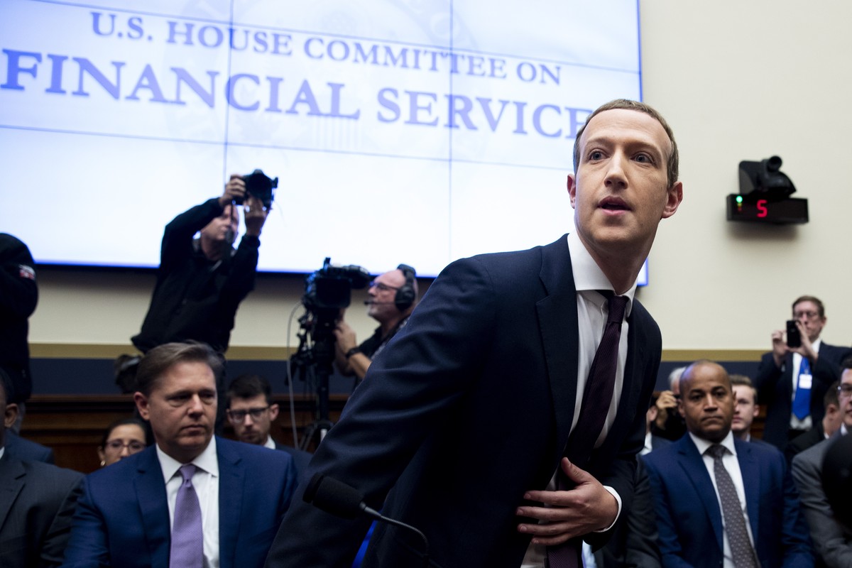 epa07971383 YEARENDER 2019 OCTOBER..Chairman and CEO of Facebook Mark Zuckerberg takes his seat to testify before the US House Financial Services Committee hearing on 'An Examination of Facebook  ...