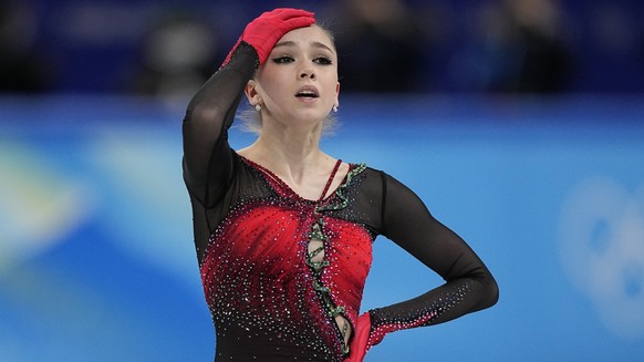 FILE - Kamila Valieva, of the Russian Olympic Committee, reacts in the women&#039;s team free skate program during the figure skating competition at the 2022 Winter Olympics, Monday, Feb. 7, 2022, in  ...