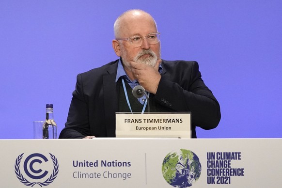 European Commissioner for European Green Deal Frans Timmermans prepares to speak during a press conference at the COP26 U.N. Climate Summit in Glasgow, Scotland, Thursday, Nov. 11, 2021. (AP Photo/Alb ...