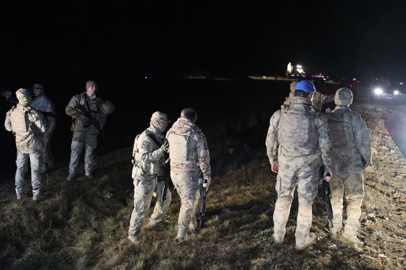 Turkish soldiers and rescue teams search for the remains of a private jet carrying Libya's military chief and four others that crashed after taking off from Ankara, killing everyone on board, in  ...