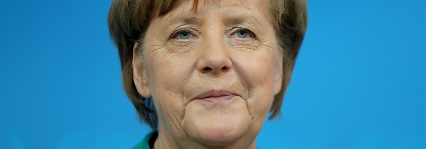 epa06565044 German Chancellor Angela Merkel speaks at a press conference after a Christian Democratic Union (CDU) party&#039;s chair board meeting at the CDU headquarter in Berlin, Germany, 25 Februar ...