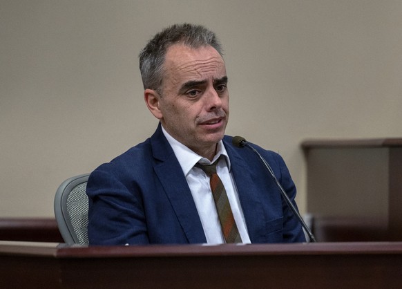 Director Joel Souza testifies in the trial against Hannah Gutierrez-Reed in state district court in Santa Fe, N.M., on Friday, March 1, 2024. Gutierrez-Reed was working as the armorer on the movie &qu ...