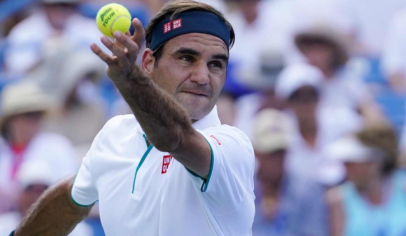 Roger Federer, of Switzerland, serves to Andrey Rublev, of Russa, during the quarterfinals of the Western &amp; Southern Open tennis tournament, Thursday, Aug. 15, 2019, in Mason, Ohio. (AP Photo/John ...