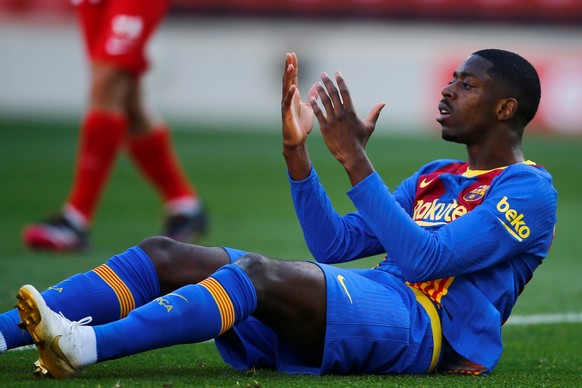 epa09185749 FC Barcelona's winger Ousmane Dembele reacts during the Spanish LaLiga soccer match between FC Barcelona and Atletico de Madrid at Camp Nou stadium in Barcelona, Catalonia, Spain, 08 ...
