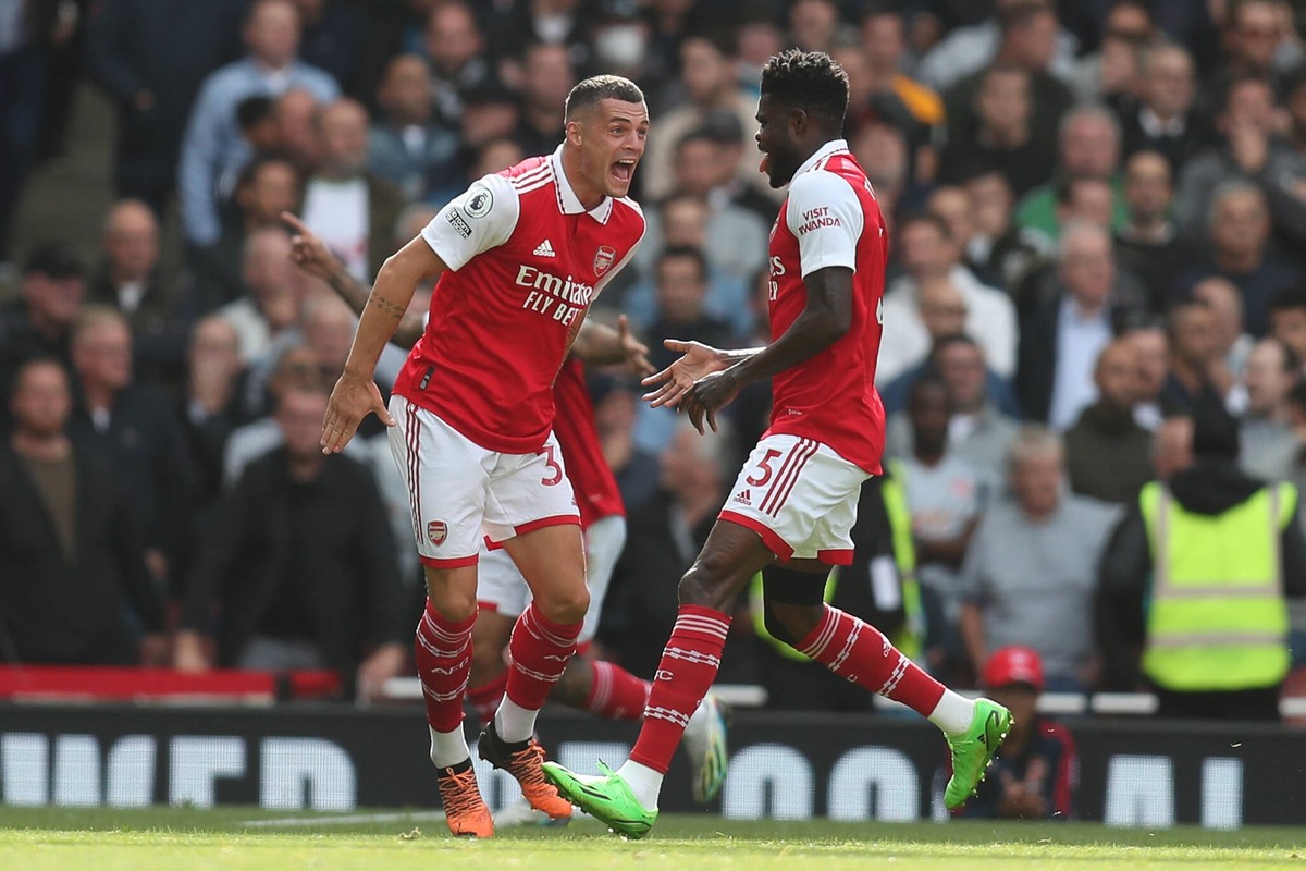 Arsenal v Tottenham Hotspur 01 October 2022 London - Premier League Football - Arsenal FC v Tottenham Hotspur - Granit Xhaka of Arsenal and Thomas Partey of Arsenal celebrate the opening goal. Photo b ...
