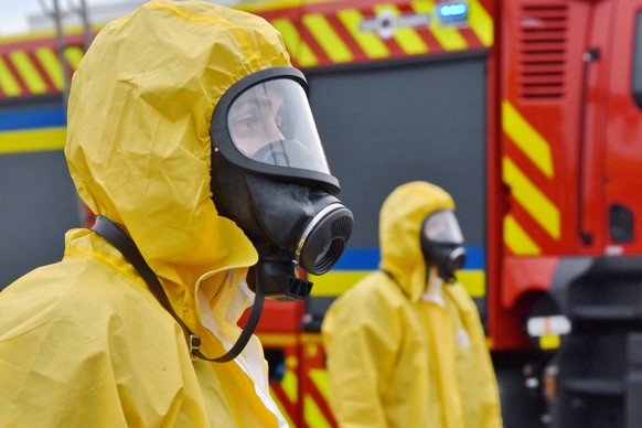 June 29, 2023, Zaporizhzhia, Ukraine: Ukrainian aid workers wear radiation protection suits during radiation exposure training in Zaporizhzhia.  A large-scale civil defense special…