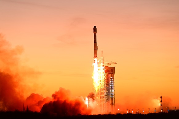 epa11049683 A Long March-2C launch vehicle carrying a test satellite for satellite internet technologies blasts off from the Jiuquan Satellite Launch Center in northwest China, December 30, 2023. The s...