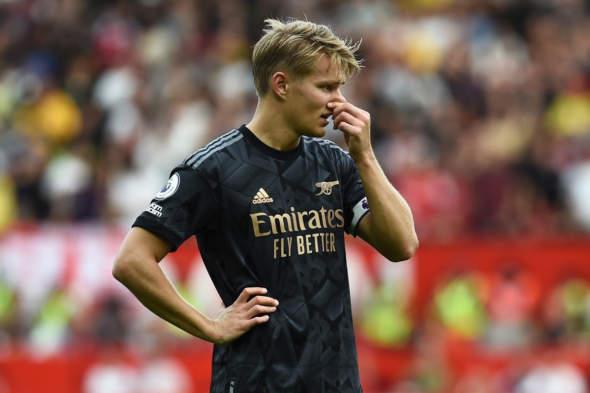 epa10159637 Arsenal FC's Martin Odegaard in action during the English Premier League soccer match between Manchester United and Arsenal FC in Manchester, Britain, 04 September 2022. EPA/PETER POW ...