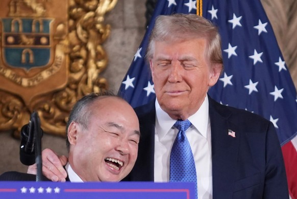 Er hat gut lachen: Masayoshi Sons Besuch bei Donald Trump in dessen Luxus-Klub Mar-a-Lago wurde als Kniefall gesehen.