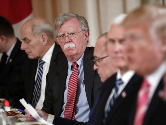 National security adviser John Bolton, second from the left, listen to President Donald Trump, far right, speak during a working lunch with Japanese Prime Minister Shinzo Abe at Trump&#039; s private  ...