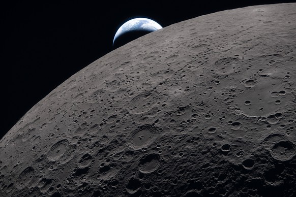 In this image provided by NASA, the Artemis II crew captured this view as the Earth sets behind the Moon during a lunar flyby, Monday, April 6, 2026. (NASA via AP)
APTOPIX NASA Artemis Moonshot