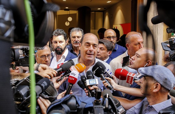 Secretary of the Italian Democratic Party (PD), Nicola Zingaretti, talks to the press outside the centre-left party headquarters in Rome, Italy, Monday, Aug. 26 2019. ingaretti challenged the 5-Stars  ...