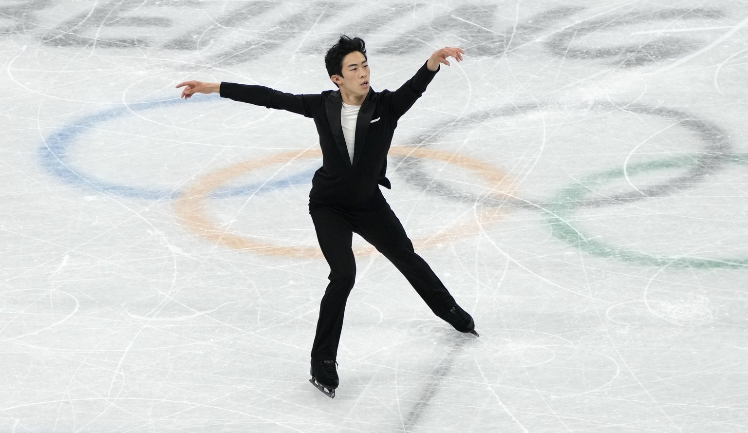 Nathan Chen, of the United States, competes during the men&#039;s singles short program team event in the figure skating competition at the 2022 Winter Olympics, Friday, Feb. 4, 2022, in Beijing. Chen ...