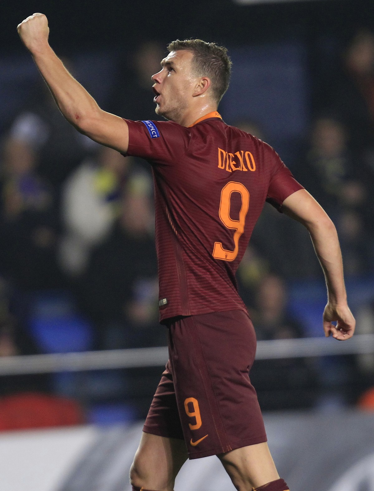 Roma's Edin Dzeko celebrates scoring his side's 2nd goal during a Europa League, Round of 32, 1st leg soccer match between Villarreal and Roma at the Ceramica stadium in Villarreal, Spain, T ...