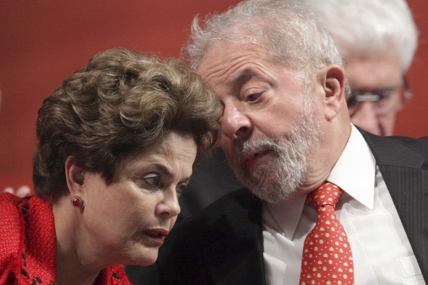 Brazil&#039;s Former President Luiz Inacio Lula da Silva, right, talks with ousted President Dilma Rousseff during the inauguration ceremony of the new Workers&#039; Party directory and of the new par ...