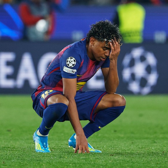 Barcelona's Lamine Yamal reacts disappointed after the Champions League quarterfinal first leg soccer match between Barcelona and Atletico Madrid in Barcelona, Spain, Wednesday, April 8, 2026. (A ...