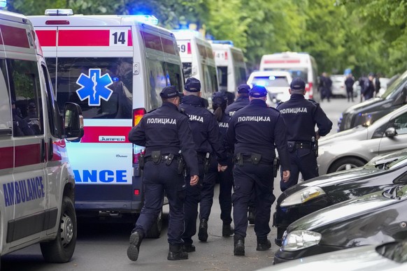 Police block the street around the Vladislav Ribnikar school in Belgrade, Serbia, Wednesday, May 3, 2023. A teenage boy opened fire early Wednesday in a school in central Belgrade, causing injuries. ( ...
