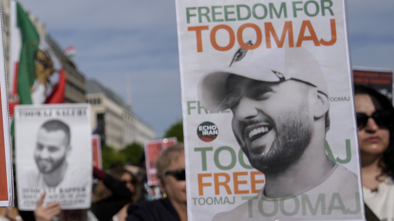 Protesters attend a rally against a death sentence given to a popular rapper in Iran and to support to the women of Iran, in Berlin, Germany, Sunday, April 28, 2024. Toomaj Salehi a 33-year-old was se ...