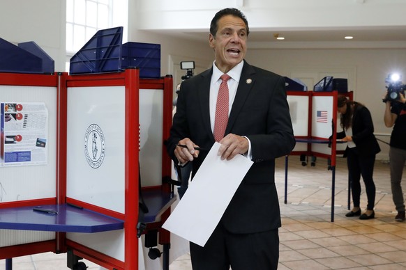 New York Gov. Andrew Cuomo speaks as he marks his primary election ballot at the Presbyterian Church of Mount Kisco, in Mount Kisco, N.Y., Thursday, Sept. 13, 2018. (AP Photo/Richard Drew)