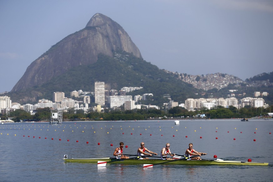 epa05467811 (L-R) Jacob Barsoe, Jacob Larsen, Kasper Joergensen and Morten Joregensen of Denmark during the Men&#039;s Lightweight Four Semifinal at the Rio 2016 Olympic Games Rowing events at the Lag ...