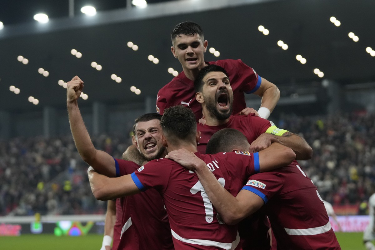 Serbia's players celebrate after a goal during the UEFA Nations League soccer match between Serbia and Switzerland at the Dubocica Stadium in Leskovac, Serbia, Saturday, Oct. 12, 2024. (AP Photo/ ...