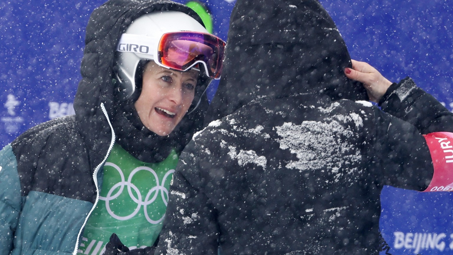 Quality Repeat: Fanny Smith of Switzerland, left, discusses with an official after the big final run at the women&#039;s ski freestyle cross competition at the 2022 Winter Olympics in Zhangjiakou, Chi ...