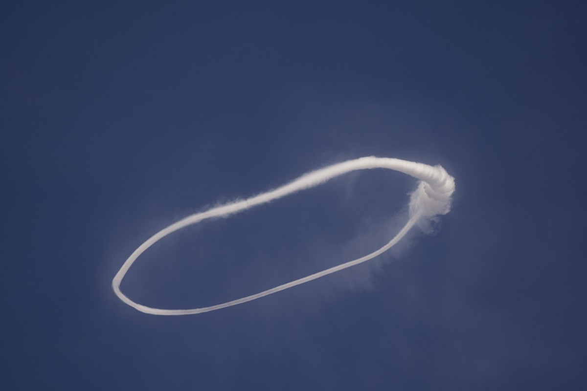 A volcanic vortex ring emerges from a new pit crater on the north side of the southeast crater of the Etna Volcano in Sicily, Italy, Friday, April 5, 2024. While the physical conditions under which vo ...