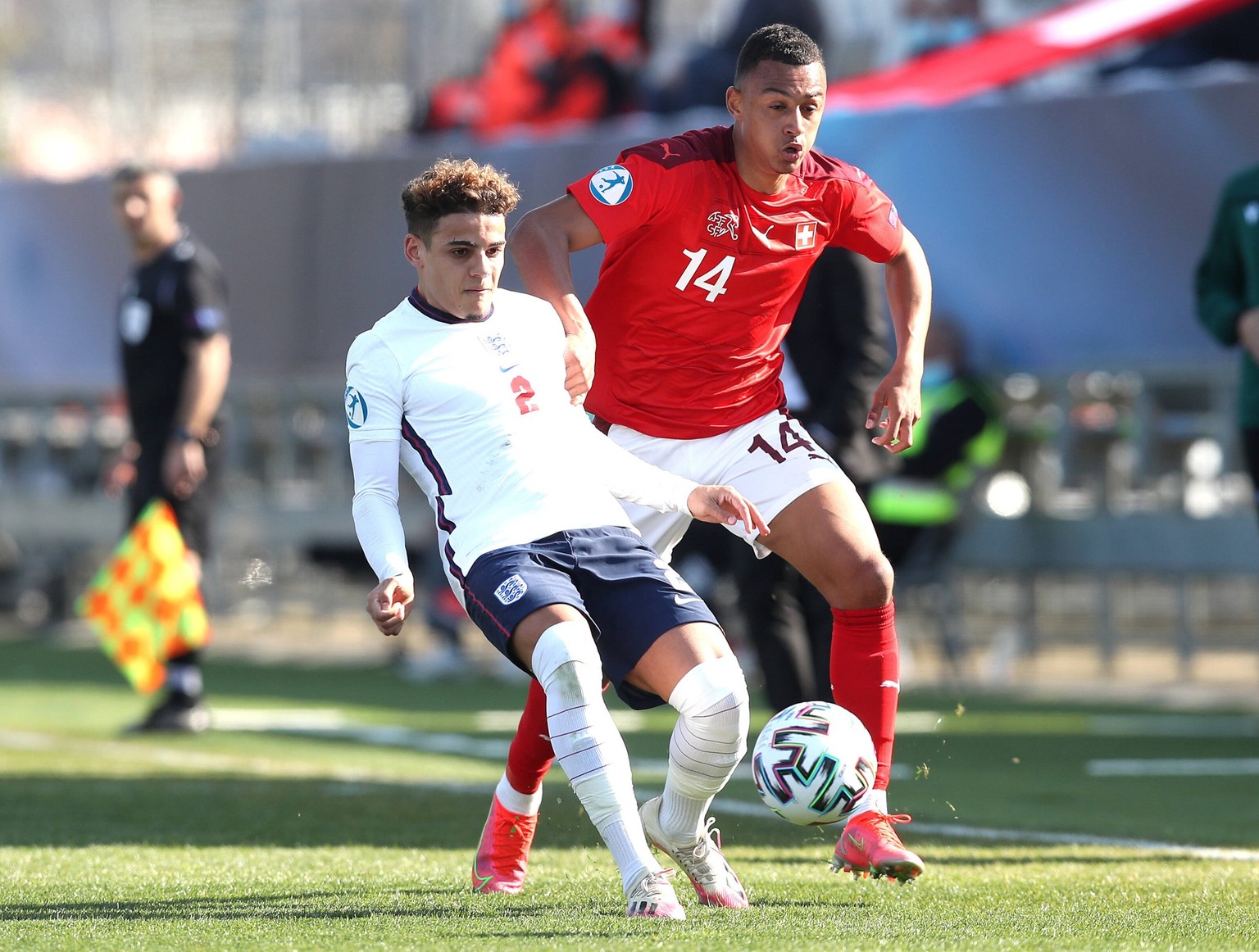England v Switzerland - 2021 UEFA European Under-21 Championship - Group D - Bonifika Stadium England s Max Aarons left and Switzerland s Dan Ndoye battle for the ball during the 2021 UEFA European Un ...