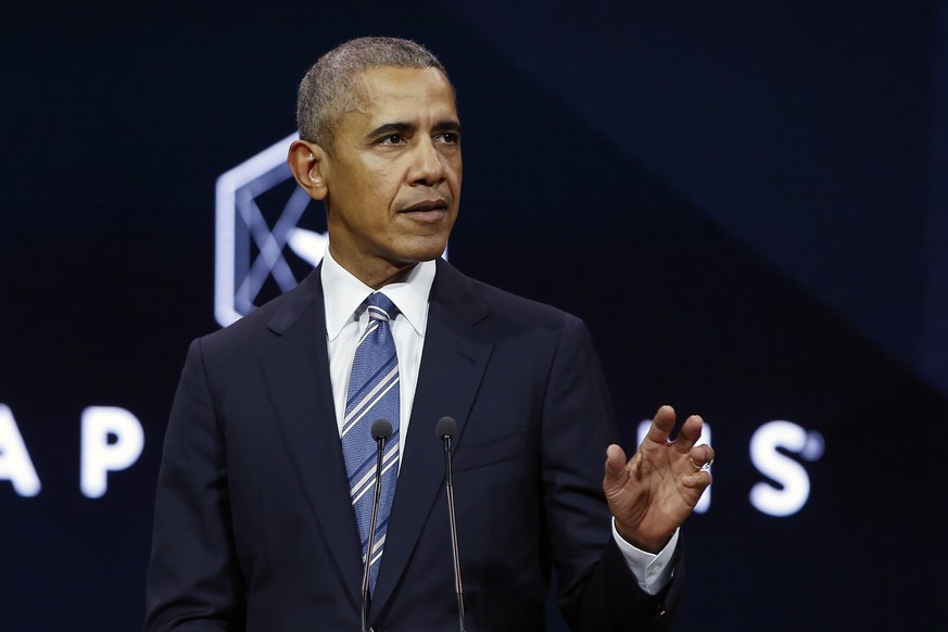 Former U.S. President Obama gives a speech, in Paris, Saturday, Dec. 2, 2017. Former U.S. President Barack Obama is ending a five-day international trip in Paris, where he is lunching with French Pres ...