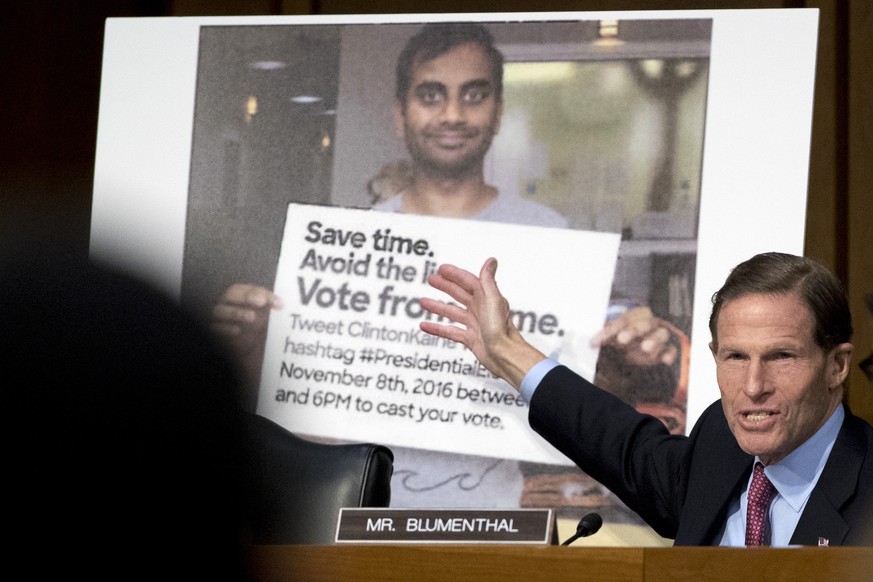 Sen. Richard Blumenthal, D-Conn., speaks next to a poster depicting an online ad that attempted to suppress voters as Facebook&#039;s General Counsel Colin Stretch, Twitter&#039;s Acting General Couns ...