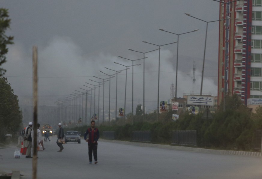 Smoke rises from a complex after an attack on the American University of Afghanistan in Kabul, Afghanistan, Thursday, Aug. 25, 2016. The attack has ended, a senior police officer said Thursday, after  ...