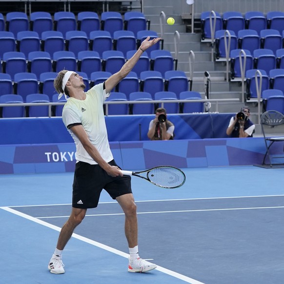 Alexander Zverev, of Germany, serves to Karen Khachanov, of the Russian Olympic Committee, during the men&#039;s single gold medal match of the tennis competition at the 2020 Summer Olympics, Sunday,  ...