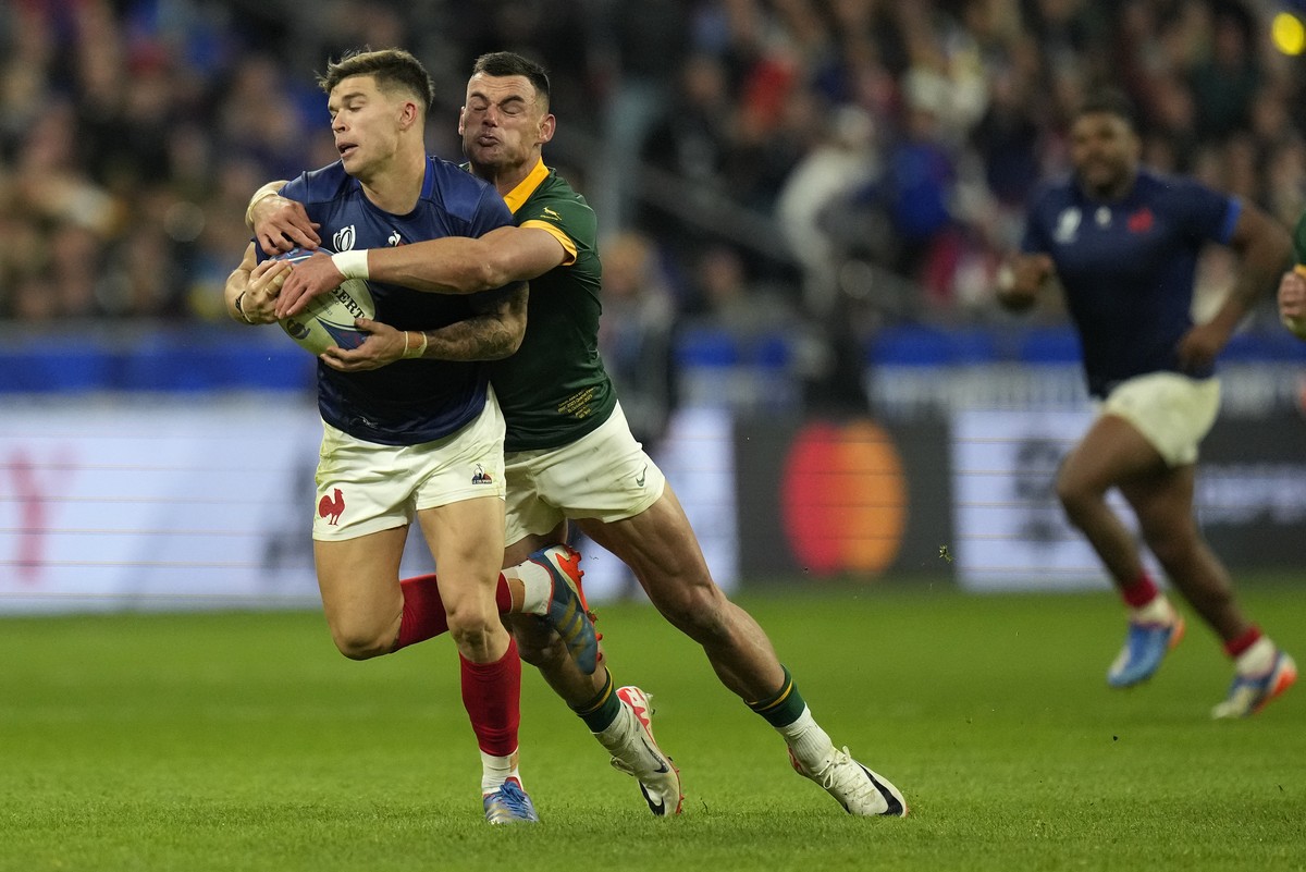 France's Matthieu Jalibert is tackled by South Africa's Jesse Kriel during the Rugby World Cup quarterfinal match between France and South Africa at the Stade de France in Saint-Denis, near  ...