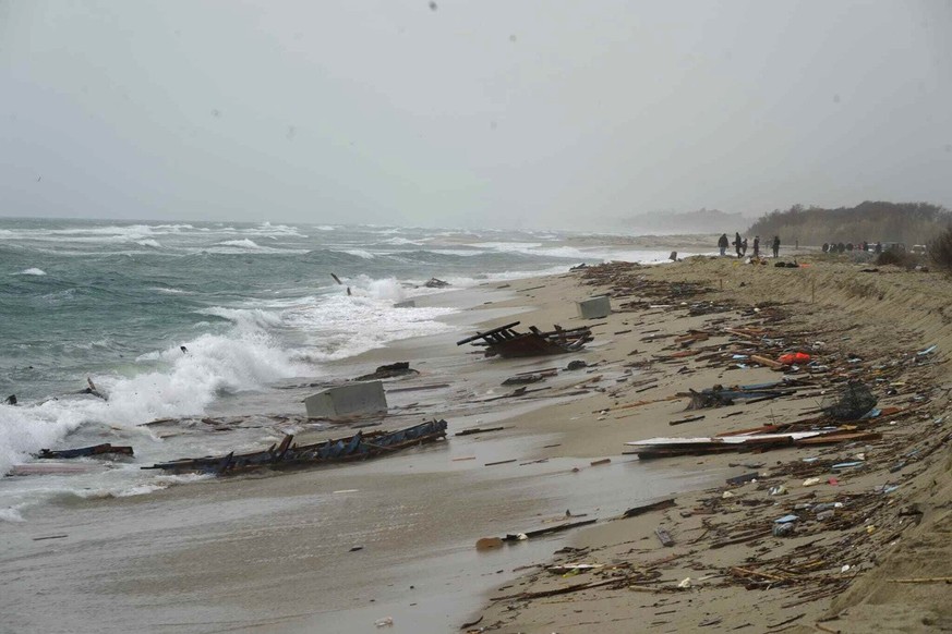 epa10492619 Debris wash ashore following a shipwreck, at a beach near Cutro, Crotone province, southern Italy, 26 February 2023. Italian authorities recovered at least 40 bodies on the beach and in th ...