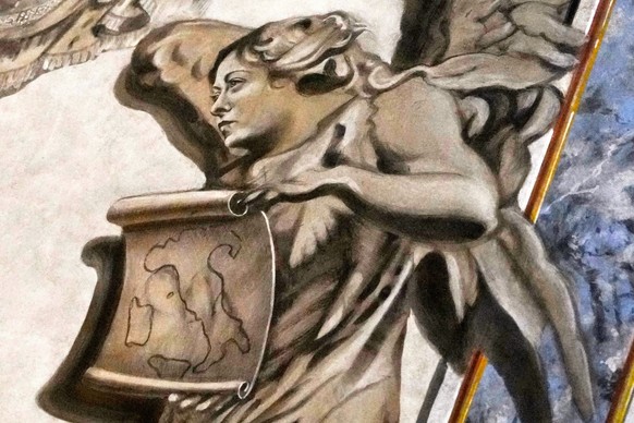 A detail of a fresco inside the Basilica of San Lorenzo in Lucina, in Rome, shows a cherub bearing a striking resemblance to Premier Giorgia Meloni, Sunday, Feb. 1, 2026. (AP Photo/Gregorio Borgia)