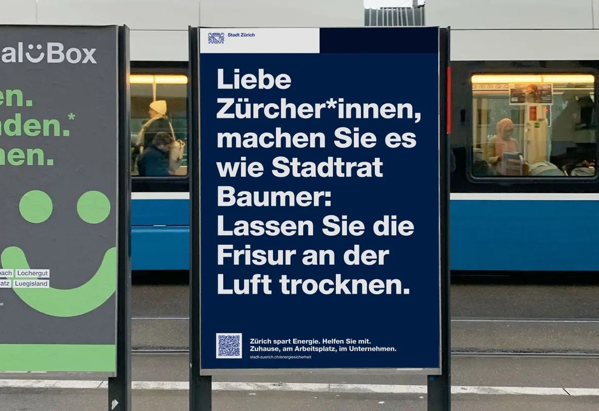 Kampagne der Stadt Zürich, welche die Bevölkerung zum Energiesparen anhält. Stadtrat Michael Baumer trägt eine Glatze.