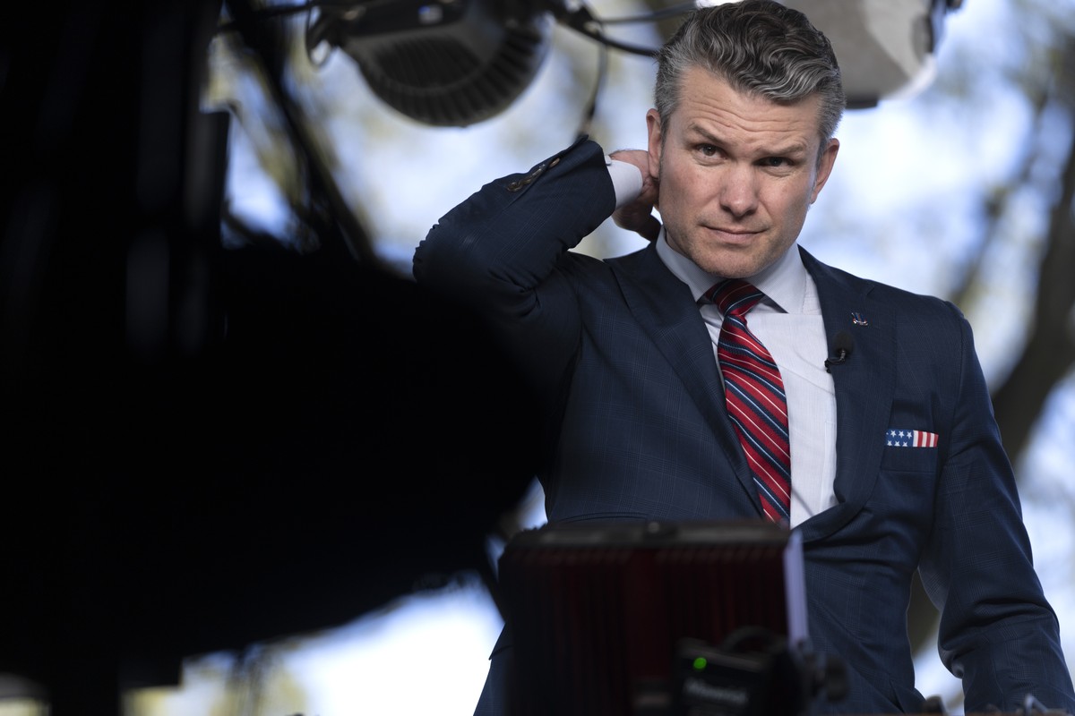 Defense Secretary Pete Hegseth prepares to give a television interview outside the White House, Friday, March 21, 2025, in Washington. (AP Photo/Mark Schiefelbein)
Pete Hegseth