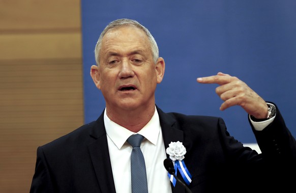 epa07892354 Leader of the Blue and White political party, Benny Gantz speaks at his party office in the Israeli Knesset ahead of the swearing in ceremony during session of the 22nd Israeli parliament, ...