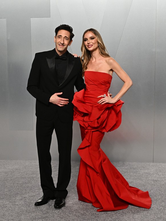 Adrien Brody, left, and Georgina Chapman arrive at the Vanity Fair Oscar Party on Sunday, March 15, 2026, at the Los Angeles County Museum of Art in Los Angeles. (Photo by Evan Agostini/Invision/AP)
A ...