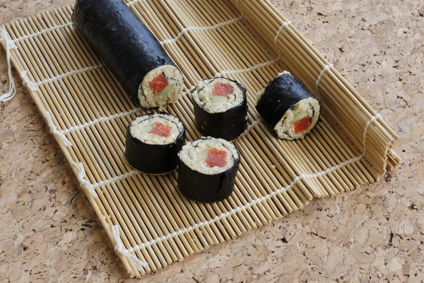 This March 2, 2016 photo shows smoked salmon and parsnip rice sushi in Concord, N.H. Finely chopped and seasoned raw parsnips can make a surprisingly delicious alternative to traditional sushi rice. ...